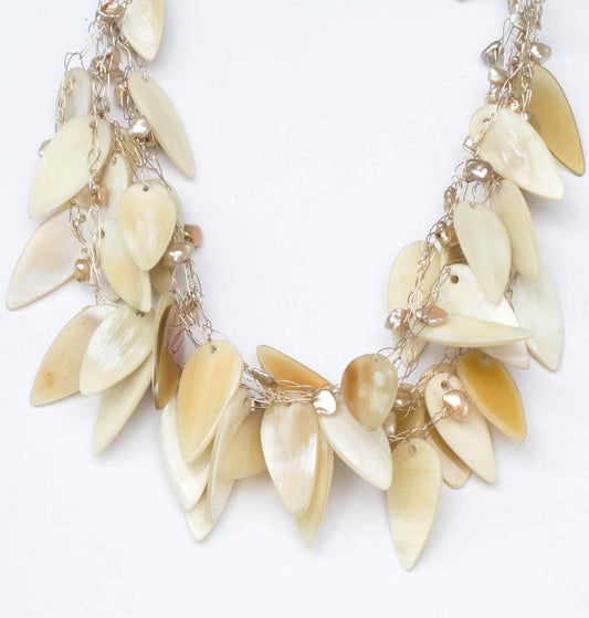 Natural horn and fresh water pearls multi strand necklace on fine silver wire.