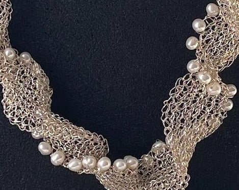 Fresh water pearls and fine silver woven necklace on an adjustable chain. From pretaporterjewels.com Jewellery that invites compliments!