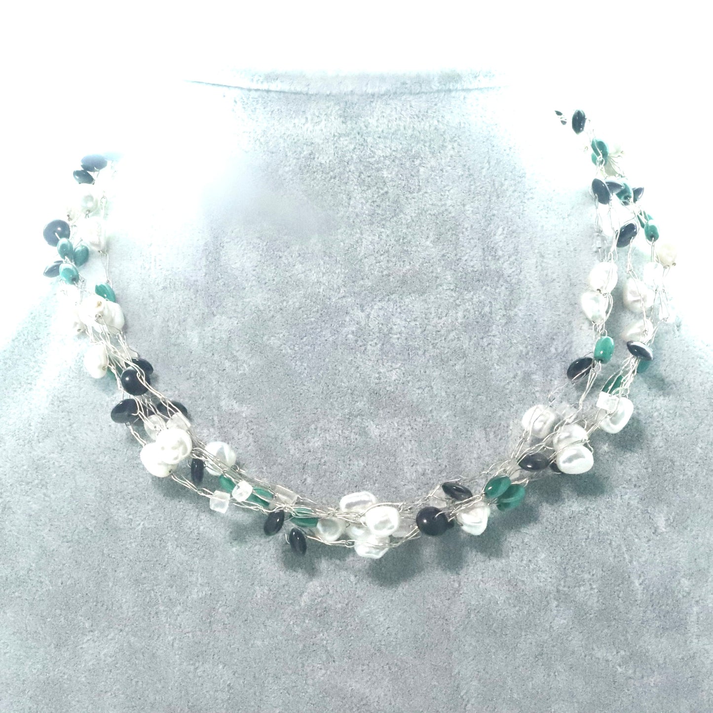 Freshwater pearls with a touch of green multi-strand necklace