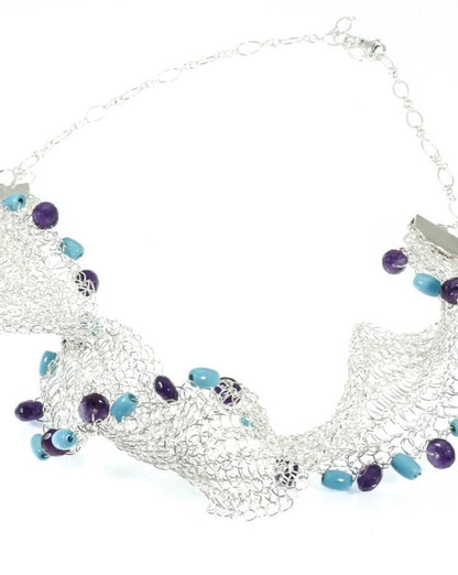 Woven fine silver necklace with turquoise and amethyst accent. From Pretaporterjewels.com Jewellery that invites compliments!