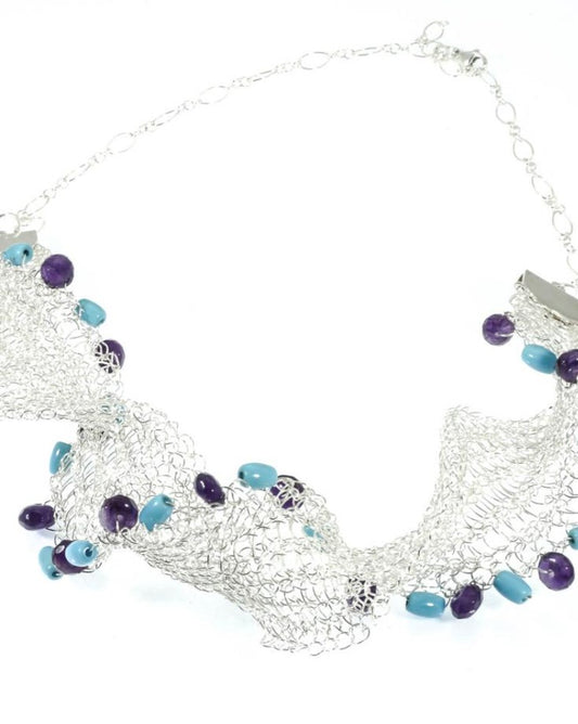 Woven fine silver necklace with turquoise and amethyst accent. From Pretaporterjewels.com Jewellery that invites compliments!