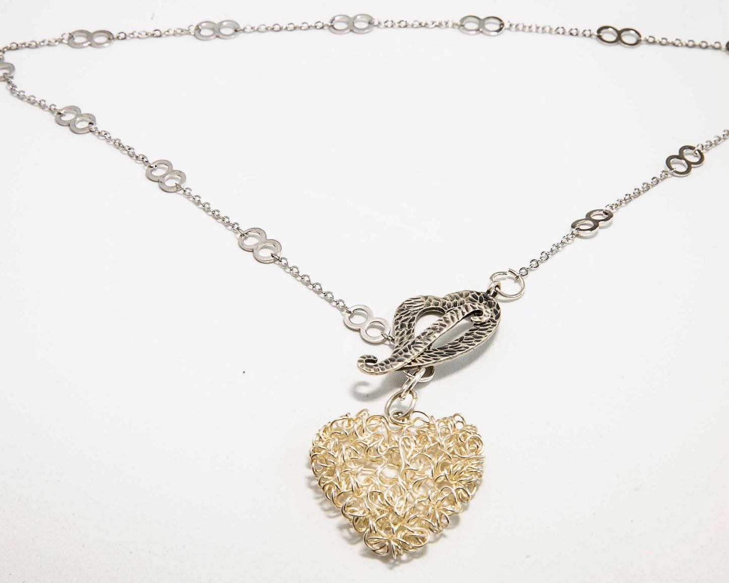 Two Sterling Silver Hearts Pendant on a Silver chain.