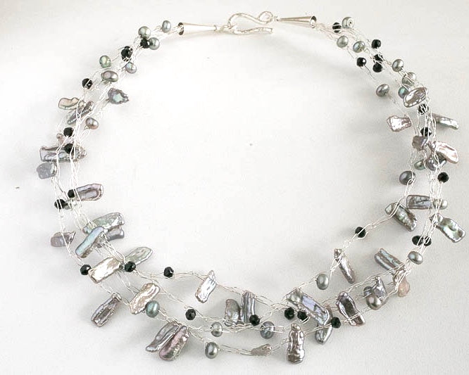 Fresh water pearl multistrand necklace available with a grey, brown, green white or peach base.