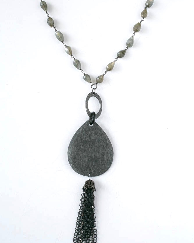 Labradorite and sterling silver oxidized chain with pear shaped horn pendant make this a one of a kind necklace.