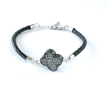 narrow braided leather bracelet with cloverleaf charm and extender chain to fit most.