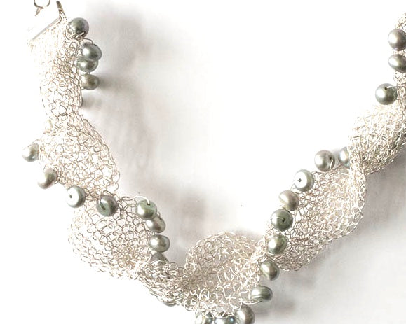 Fresh water pearls and fine silver woven necklace on an adjustable chain. From pretaporterjewels.com Jewellery that invites compliments!
