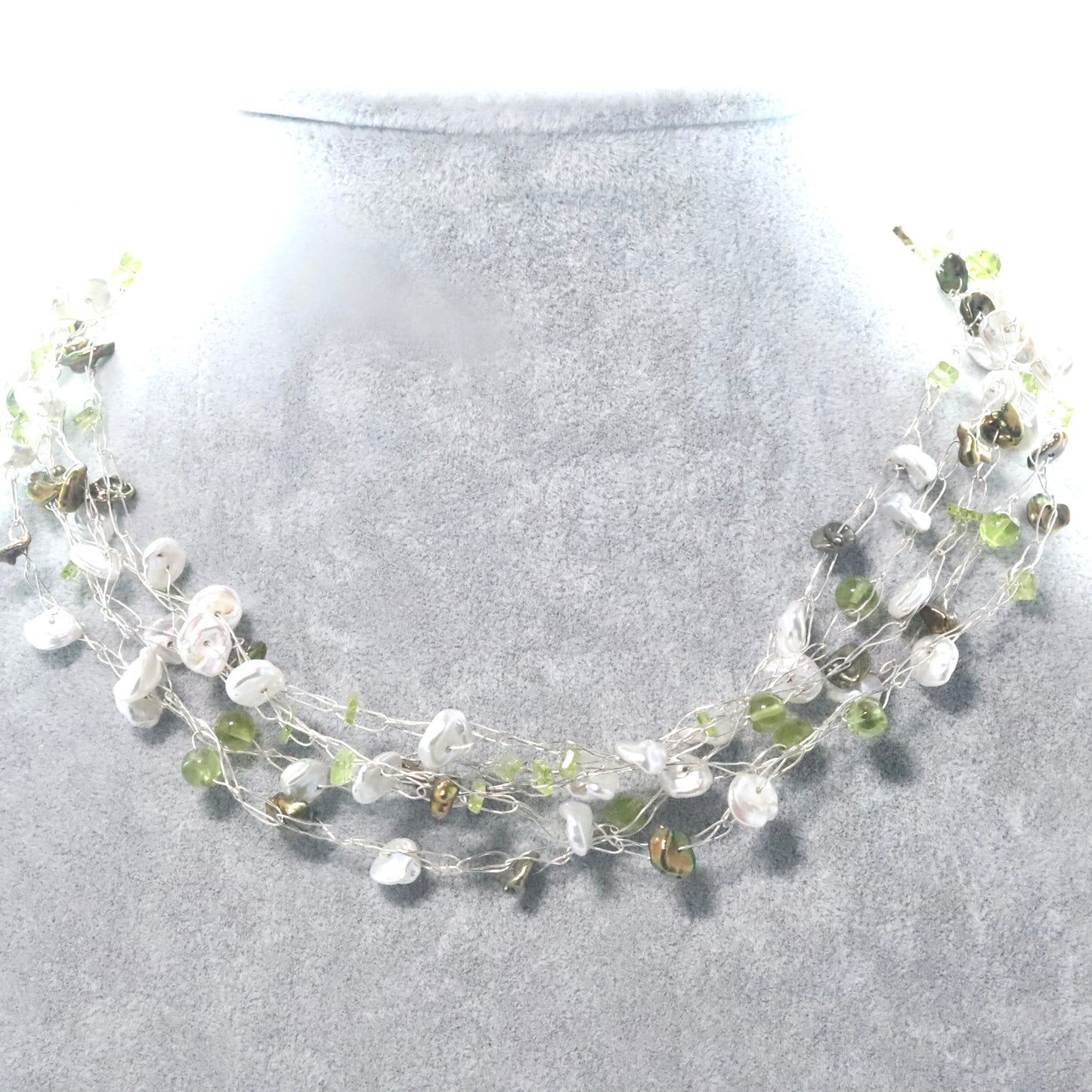 Freshwater pearls with a touch of green multi-strand necklace