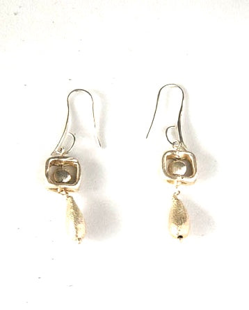 Earrings with a Sterling Silver square with tear drop bead hanging all in sterling Silver.