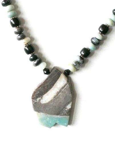 large agate pendant on an onyx and agate necklace. It is 18 inches long with a sterling silver hook clasp. by pretaporterjewels.com jewellery that invites compliments!