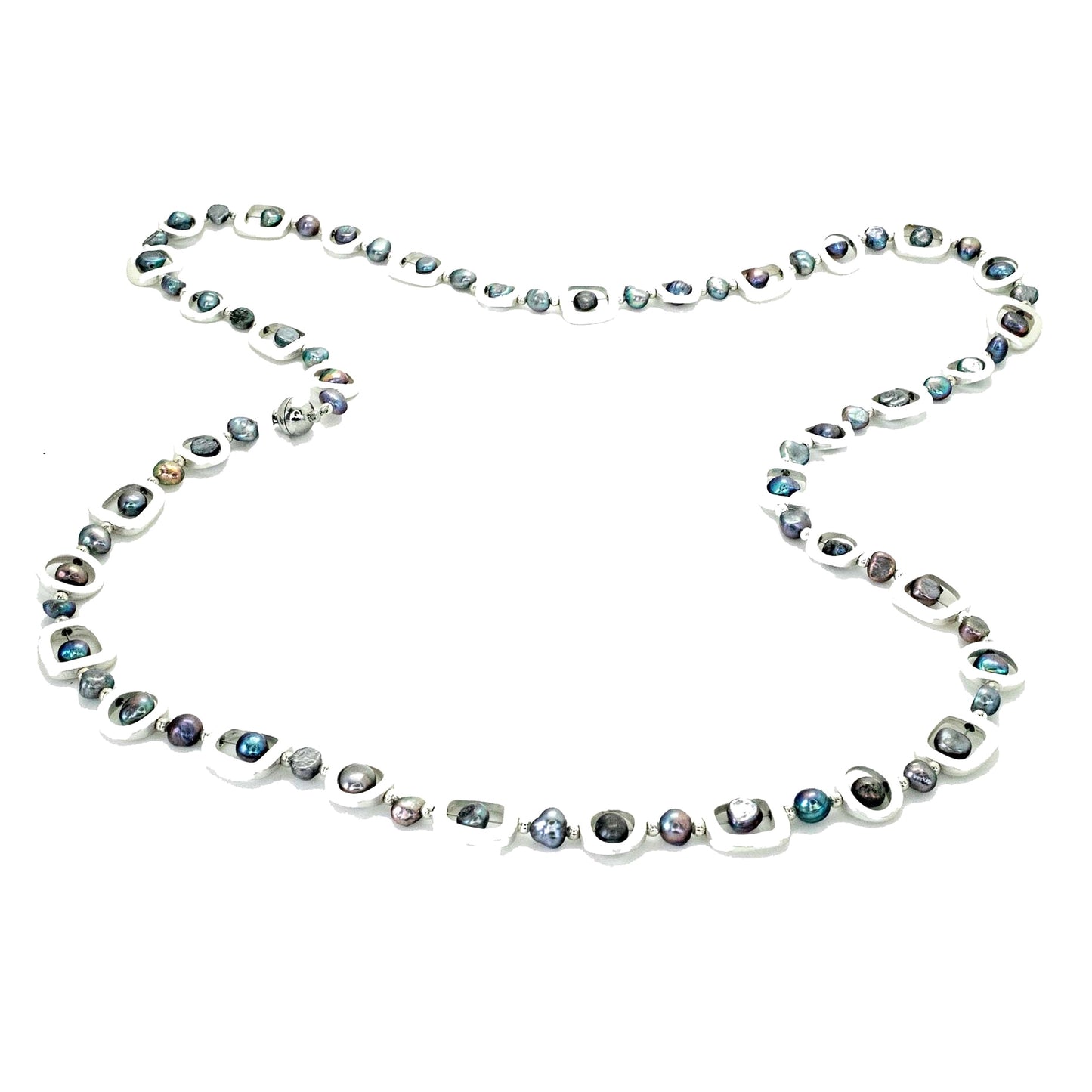 Black fresh water pearls in geometric shape frames making a long necklace with magnetic clasp.
