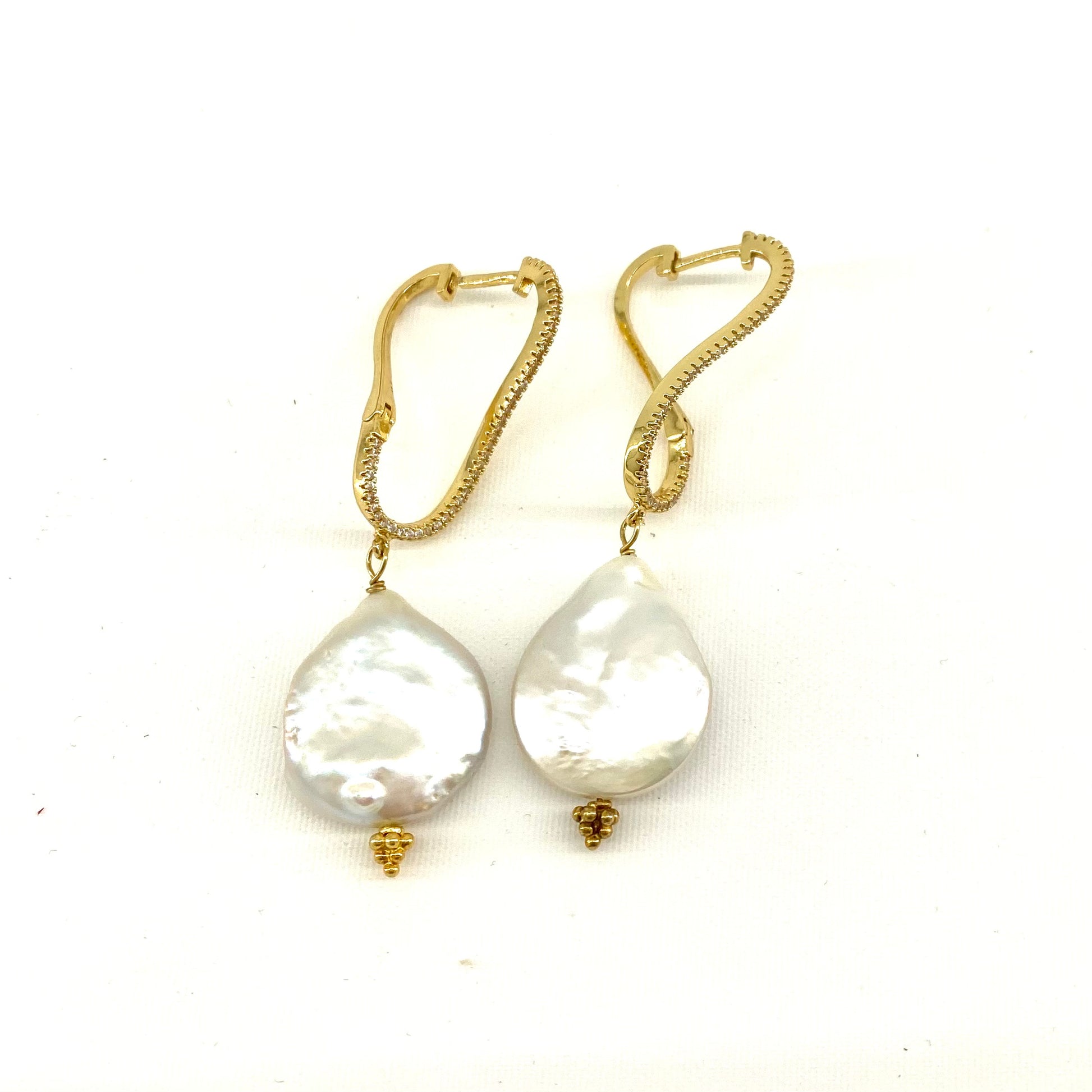 Twisted hoop gold earrings with large coin freshwater pearl